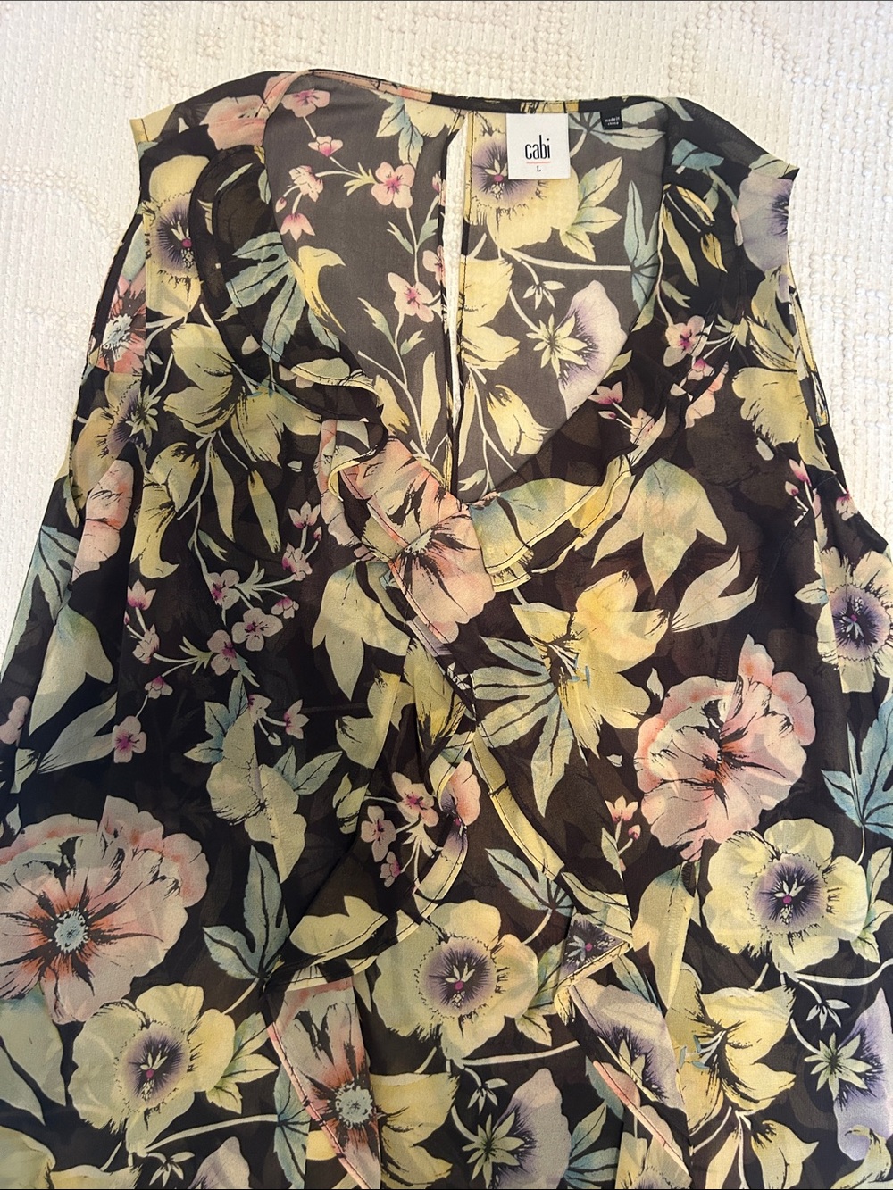 CAbi Black Floral Ruffle Front Top with Pastel Blooms